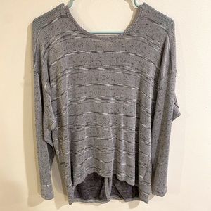 Grey sweater with bow detail. Size large.